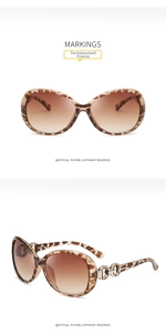 Detailed view of tortoise shell butterfly sunglasses with brown gradient lenses and metal trim
