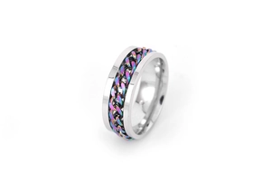 Close-up of rotatable stainless steel ring with colorful rainbow chain inlay