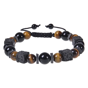 Detailed view of tiger eye, lava rock beads and adjustable braided cord on men's bracelet