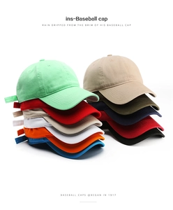 Detailed stack of cotton baseball caps in eleven vibrant colors on a clean white background
