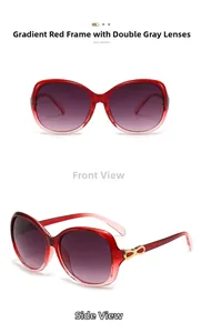 Detail view of oval sunglasses featuring red gradient frames and golden bow decoration
