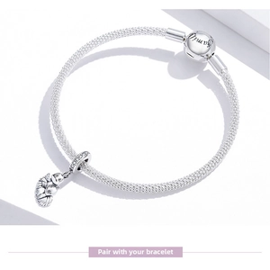 Detail of 925 sterling silver mesh bracelet featuring family engraving and crystal pendant