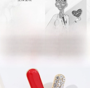 Detail of silver medical nurse pin and red heart brooch with crystal accents