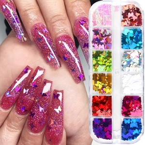 12-grid box of holographic butterfly nail sequins and demo on pink glitter long nails