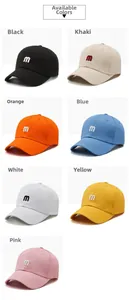 Array of colorful cotton baseball caps featuring embroidered letter M logo