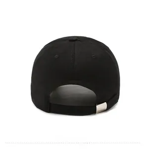Rear view of black cotton baseball cap showing adjustable silver metal buckle and stitching
