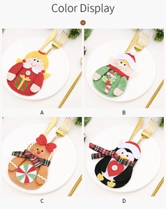 Detailed view of four festive Christmas cutlery holders featuring gingerbread and penguin