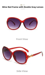 Detail view of burgundy sunglasses with gradient lenses and a golden bow on the frame