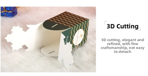 Close-up of green Christmas gift box with wavy patterns and unique petal-shaped opening