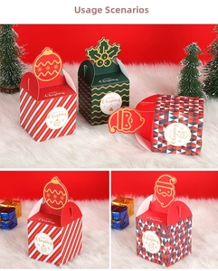 Detailed view of three festive Christmas gift boxes with holiday patterns and gold lettering