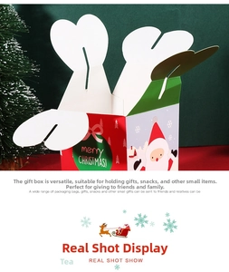 Close-up of Christmas apple box with heart-shaped cutout and Santa Claus pattern