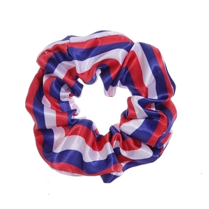 Satin scrunchie with American flag red white and blue stripe pattern on white background