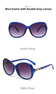 Close-up of golden bow detail on blue oval sunglasses with gradient gray lenses