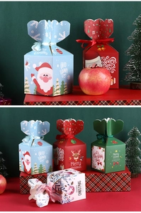Detailed view of assorted Christmas gift boxes with ribbons and festive holiday patterns