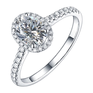 Sparkling silver oval halo engagement ring with pavé moissanite on a polished band