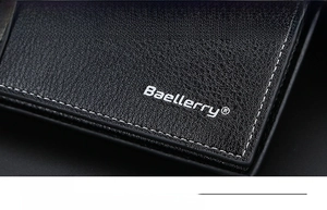 Close-up of black litchi pattern leather wallet with silver logo and white stitching