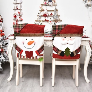 Christmas chair covers featuring Santa and Snowman in red and green festive plaid patterns