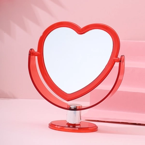 Red heart-shaped desktop makeup mirror with transparent frame and adjustable stand