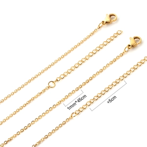 Detail of 1mm gold snake chain necklace showing lobster clasp and 5cm extension