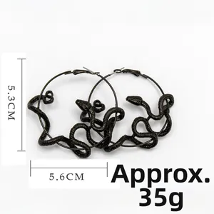 Close-up of black snake-wrapped hoop earrings in gothic style with size 5.6cm measurements