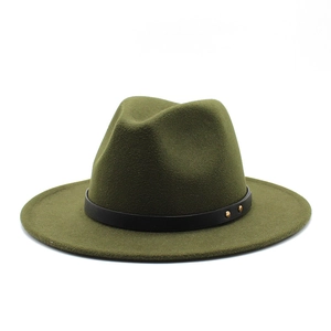Close-up of olive green wool fedora hat featuring black leather band and gold studs