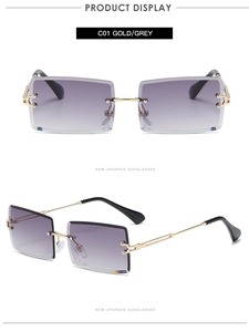 Detail view of rimless square sunglasses with gold frame and grey purple gradient lenses