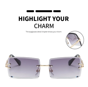 Detail of rimless square sunglasses with purple gradient lens and gold metal temples