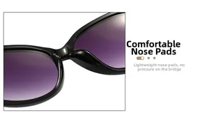 Detail view of comfortable nose pads on black oval sunglasses with gradient lenses