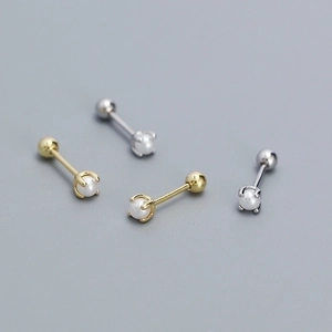 Elegant S925 silver pearl stud earrings in gold and silver finish on gray background