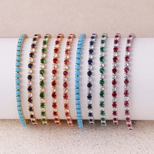 Colorful 3.0 zircon tennis bracelet set with turquoise and varied gemstones on a display