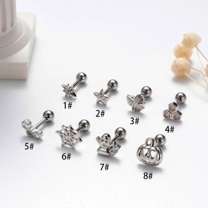 Set of 8 stainless steel Halloween cartilage earrings featuring pumpkin and ghost designs