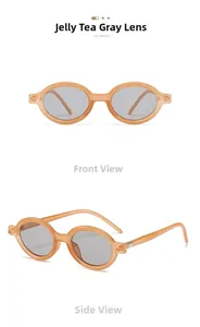 Detail view of retro oval sunglasses with jelly tea-orange frames and grey lenses