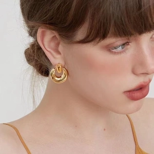 Exaggerated 18K gold plated copper bell earrings for women with a vintage metallic texture