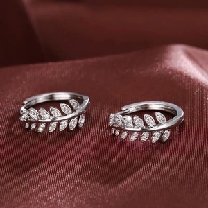 Exquisite leaf-shaped silver hoop earrings featuring micro-pave cubic zirconia stones