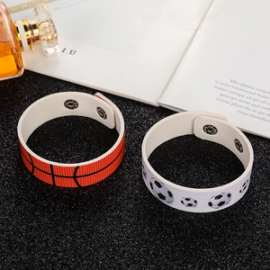 Sports themed PU leather bracelets featuring basketball and soccer patterns with snap buttons