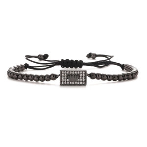 Men's punk braided bracelet with black beads and a micro-set zircon crown charm