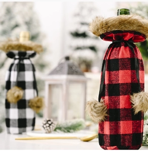 Close-up of red and black buffalo plaid wine bottle covers with soft faux fur collars