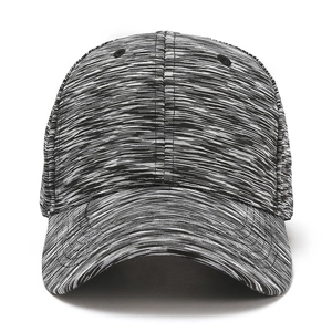 Close-up of the six-panel structure and breathable eyelets on a gray marl baseball cap
