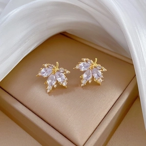 Elegant gold maple leaf jewelry set with purple and white zircon in a gift box