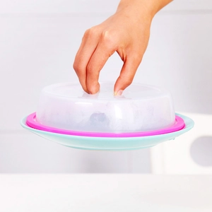 Stackable microwave food cover with pink sealing ring and heat-resistant handle
