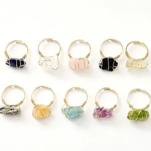 Handmade adjustable wire wrapped ring set featuring 10 natural raw gemstone varieties
