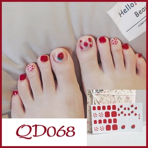 Detailed strawberry pattern and red polka dot toe nail wraps with professional finish