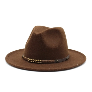 Detail of dark brown wool fedora with a decorative leather band and vintage beads