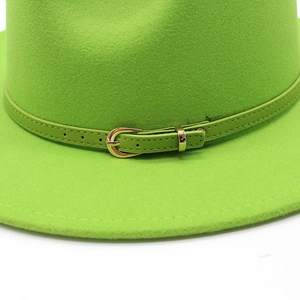 Bright green wool fedora with flat brim and gold equestrian buckle on leather strap