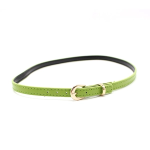 Detailed shot of vibrant lime green slim belt with gold U-shaped buckle and fine stitching