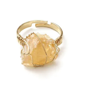 Adjustable gold handmade wire wrapped ring with irregular natural raw yellow gemstone