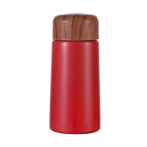 Mini 150ml matte red insulated bottle with stylish wood grain lid on white background