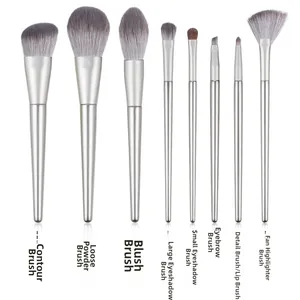 Detailed set of 8 silver makeup brushes with soft bristles for face and eye makeup