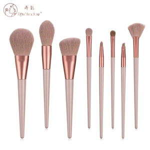 Detail of 8pcs makeup brush set with dusty pink bristles and rose gold metal ferrules