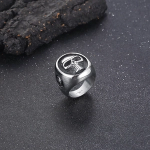 Macro shot of punk skull ring in 316L stainless steel with gothic textured details